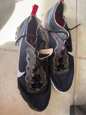 Nike Black Grid Trainers with White Swoosh and Red Heel Tab